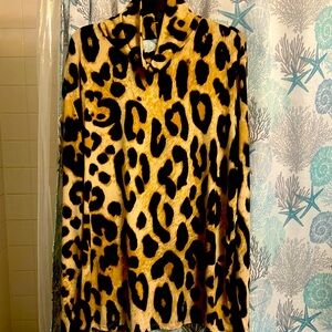 Cheetah print turtleneck with Open back size XXL. Worn once great condition.